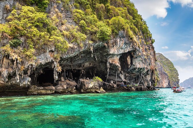 Phi Phi and Khai Islands Snorkeling Tour with Lunch by Speedboat - Pileh Bay: your lagoon break for swimming and paddleboarding
