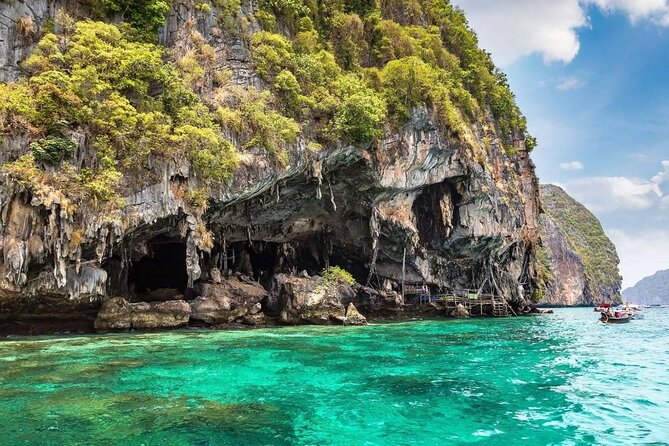 Phi Phi & Bamboo Islands Snorkeling Tour w/ Fins by Speedboat - Viking Cave: quick scenery and snorkeling-friendly water time