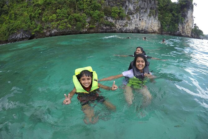 Phi Phi & Khai Islands Speedboat Tour from Phuket with Snorkeling - Phi Phi Lee (Phi Phi Leh): Maya Bay and the cliffs you came for